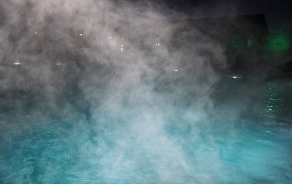 heated pool at night